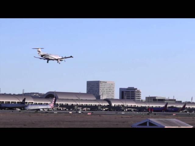 Small Plane Landing - John Wayne Airport - Tractors, Trains & Planes