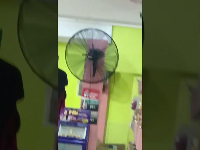 26" Deton industrial wall fan at grocery