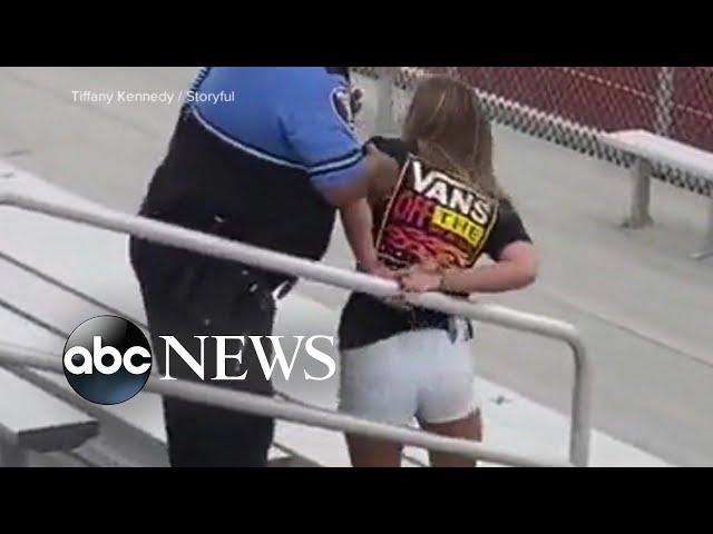 Woman tased, arrested for refusing to wear a mask at football game | WNT