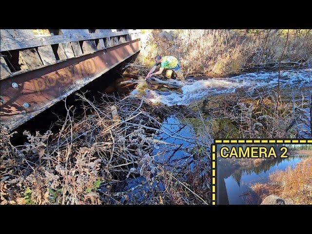 Complete Unclogging Of A Bridge Creating Massive Flow And Draining Pond