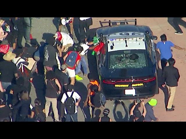 Black Lives Matter protesters smash window of CHP cruisers near downtown LA I ABC7