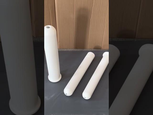Aluminum titanate dosing tube for dosing furnaces