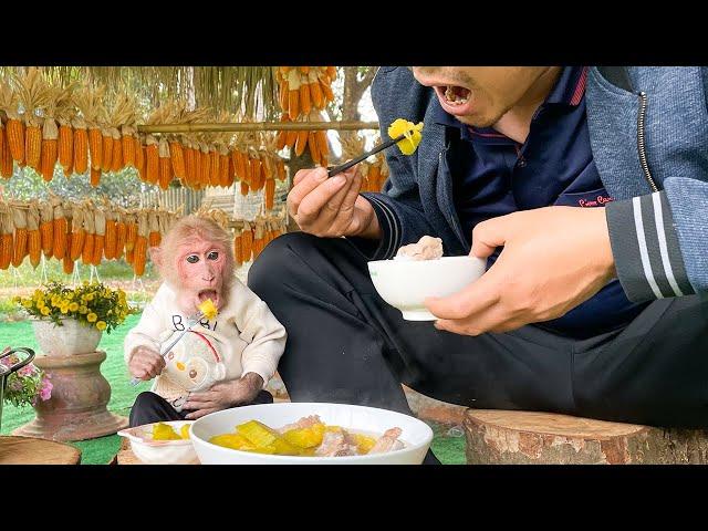 Bibi enjoys a warm meal with Dad!