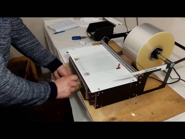 Delta200c overwrapping machine, super low price and effective work.