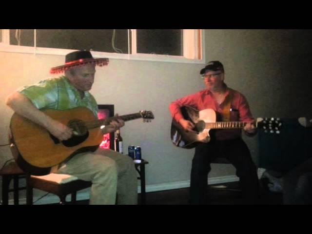 Guitarists play "folsom prison blues  - Johnny Cash"