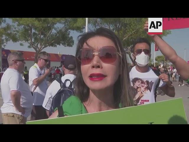 Iranian fans in Qatar support protests in Iran