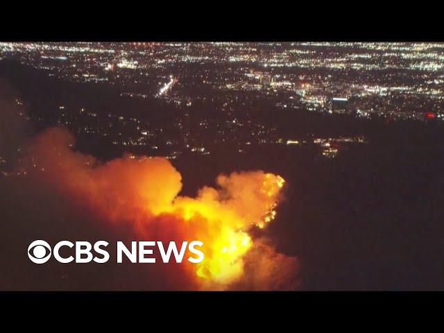 Aerial footage of California fires shows rapid expansion of blazes