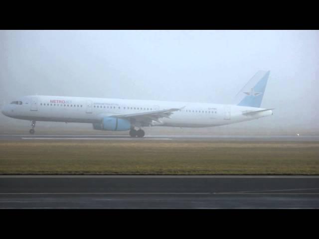 Foggy Kolavia MetroJet A321 landing Salzburg Airport visual runway 33