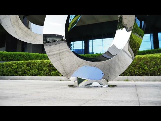 sculpture0755.com, Large outdoor stainless steel streamer sculpture: dynamic beauty in space