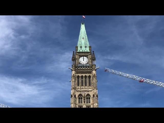 Canadian Parliament Ottawa - Peace Tower bell striking 12 O’clock mid-day