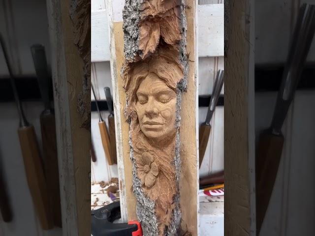 Carving a Woman in Wood