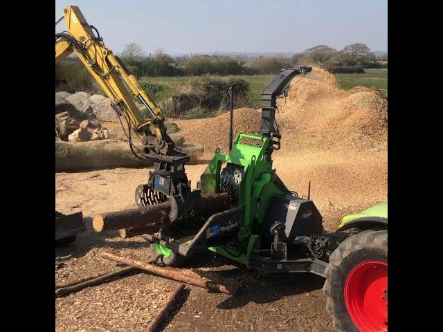 Processing wood in our yard for bio fuel