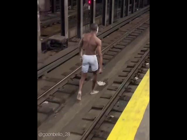 Only in New York will you find a human walking the train tracks