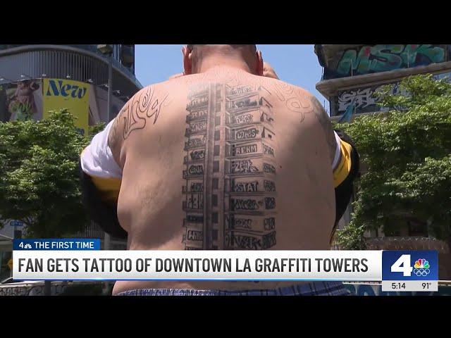 Fan gets tattoo of downtown LA Graffiti Tower