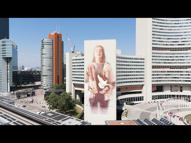 Woman with Dove - Shaping Our Common Future
