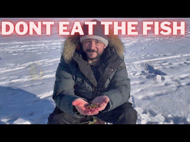 American In Russia Ice Fishing On Largest Lake On Earth