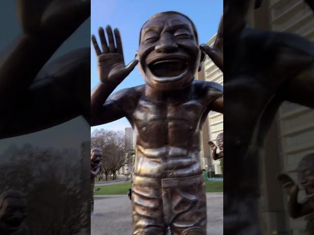 A-maze-ing Laughter; Bronze figures at English Bay in Vancouver BC. Artist, Yue Minjun