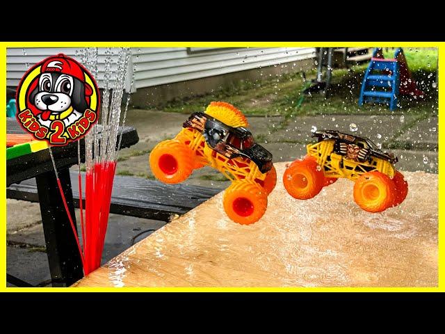 Monster Jam Fire & Ice WATER SLIDE RACE (ft. Hot Wheels Monster Trucks BIG RIGS)