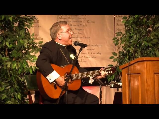 Bishop Cistone sings 'Friends in Low Places'