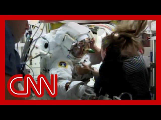 NASA halts spacewalks after water leaked into astronaut's helmet