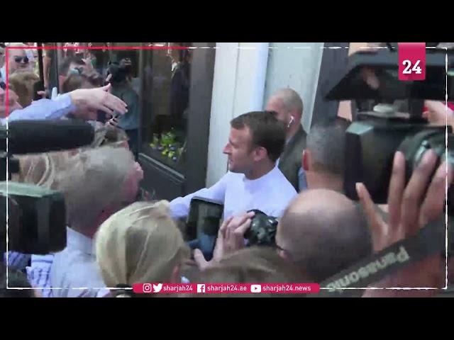 Macron greets crowd during holiday walkabout in Le Touquet