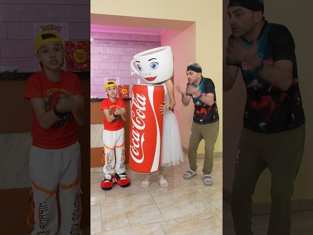 Not sharing Coca-Cola… even the giant bottle! 