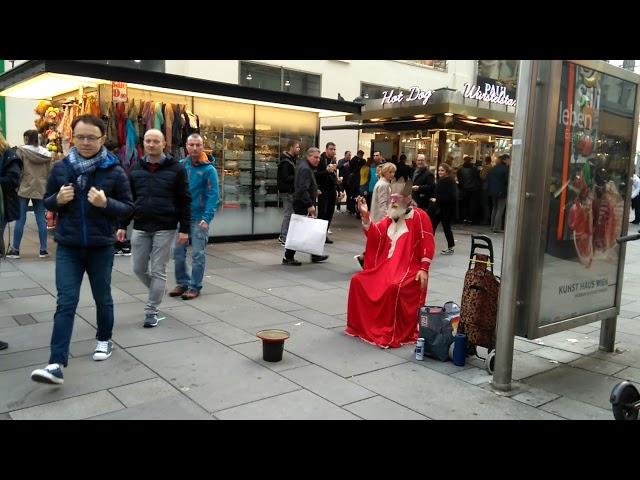 Funny street performer on Marco-d'Aviano-Gasse in Vienna, Austria (November 2018)