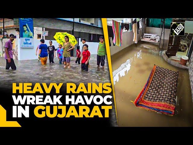 Gujarat: Rain water enters houses, disrupts normal life in Ahmedabad