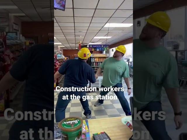 Construction workers at the gas station