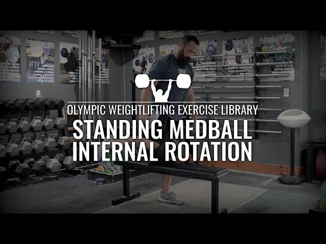 Standing Medball Hip Internal Rotation | Olympic Weightlifting Exercise Library