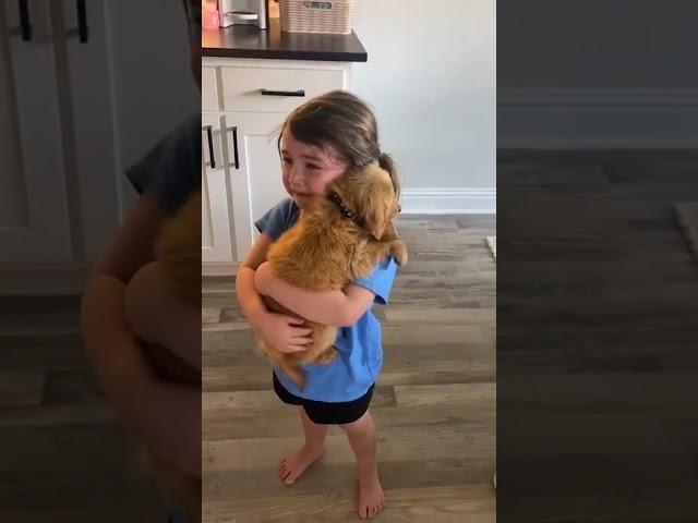 Little girl sobs as she holds her new puppy | Humankind #Shorts