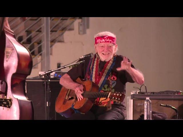 Willie Nelson performs classic country songs at Kamala Harris rally in Houston, Texas