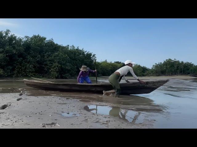 FABIOLA E FABIANE PESCAM NA SECA EXTREMA DO LAGO AMANÃ/AMAZONAS.