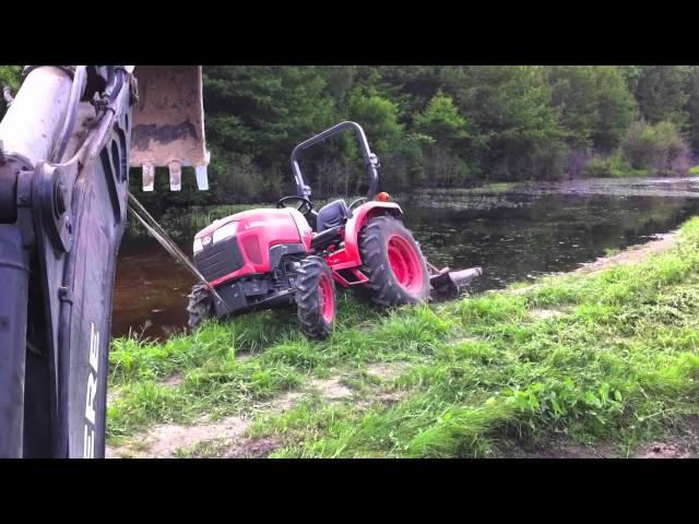 Stuck the Tractor.... Again...!  Backhoe to the Rescue..