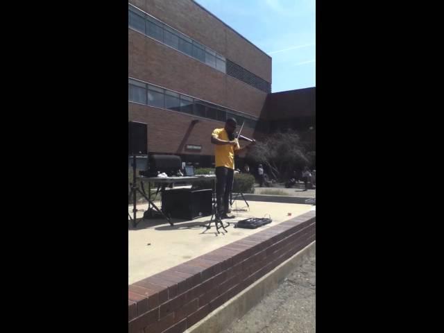 Badass dude rocking the violin