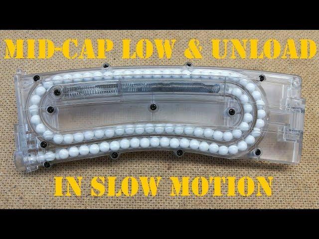 Airsoft mid-cap magazine transperent insert load & unload slow motion