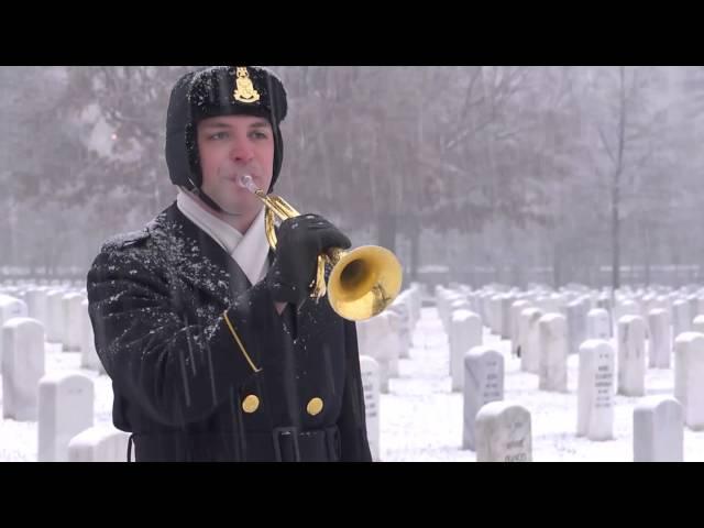 "Taps" performed by United States Army Band Bugler in Arlington National Cemetery in snow.