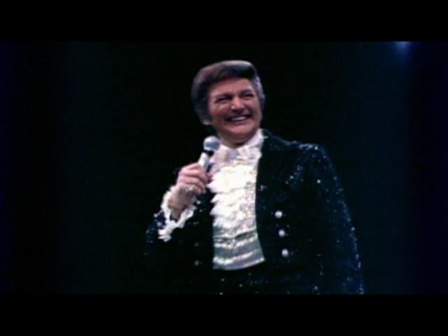 Liberace Talking To His Audience