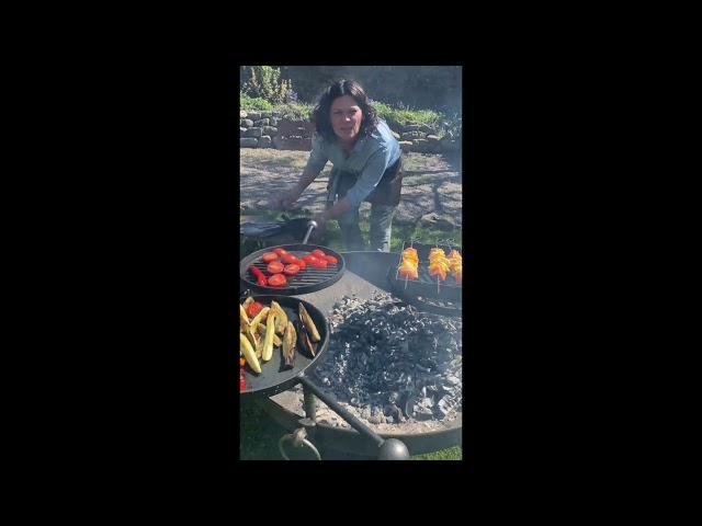 Genevieve Taylor BBQing on a wood fired fire pit, made by FirepitsUK