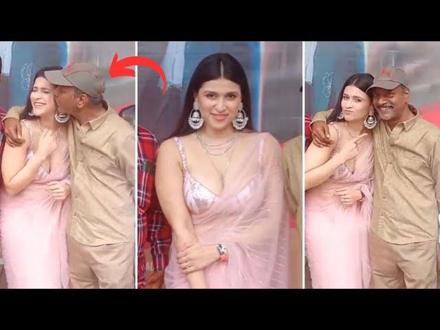 Director AS Ravi Kumar kisses Priyanka Chopra's cousin Mannara Chopra at public event