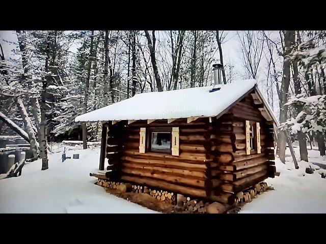 Overnight visit to a snowy log cabin.( No talking)