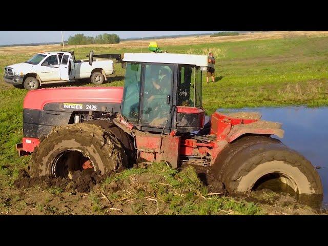 Powerful tractor got stuck in mud! Heavy agricultural machinery works off-road!