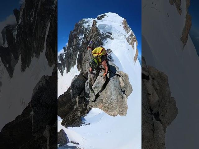 Climbers Reaching Alps Summit