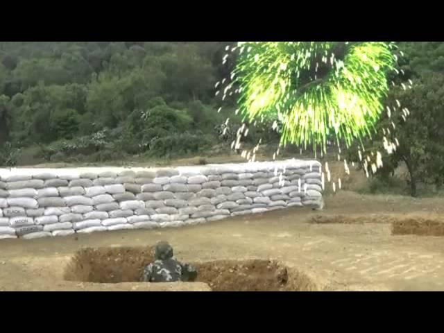 Chinese soldier drops "grenade"