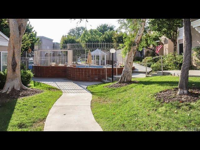 17734 Devonshire Street, Northridge, CA Presented by Kim Cocuzza.