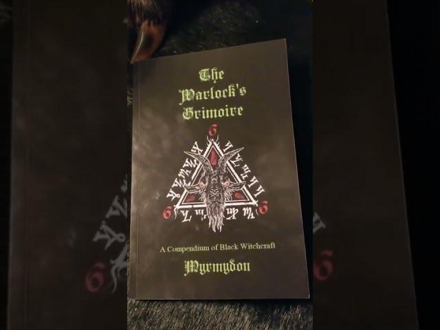 'The Warlock's Grimoire: A Compendium of Black Witchcraft' book overview.