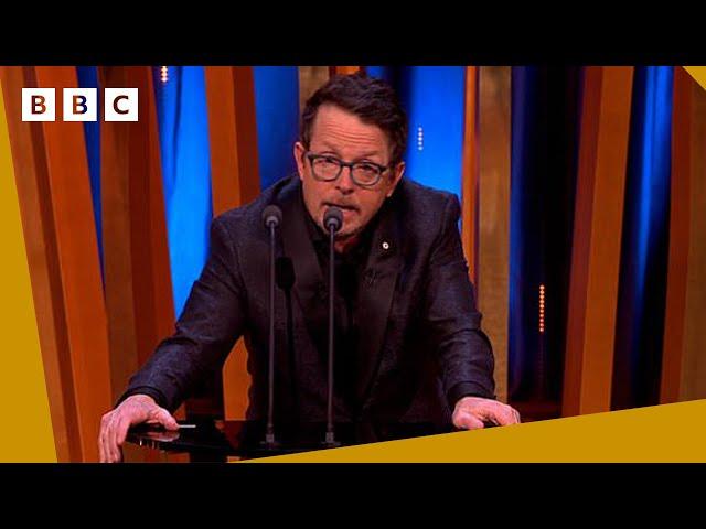 Michael J. Fox receives standing ovation as presenter for Best Film  | BAFTA Film Awards 2024 - BBC