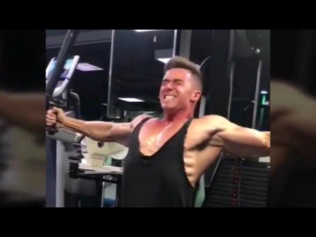 Bodybuilder Alexander Karpov flexing muscles