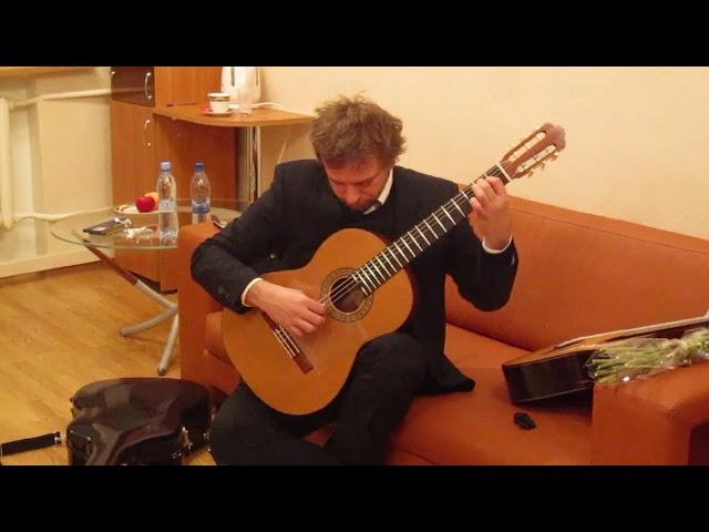 Marcin Dylla plays Pavel Gavryushov's guitar