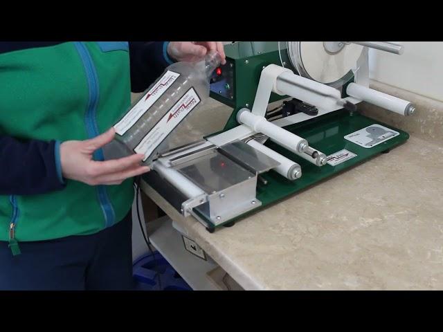 Labeling a square bottle with New Path WP20 label applicator